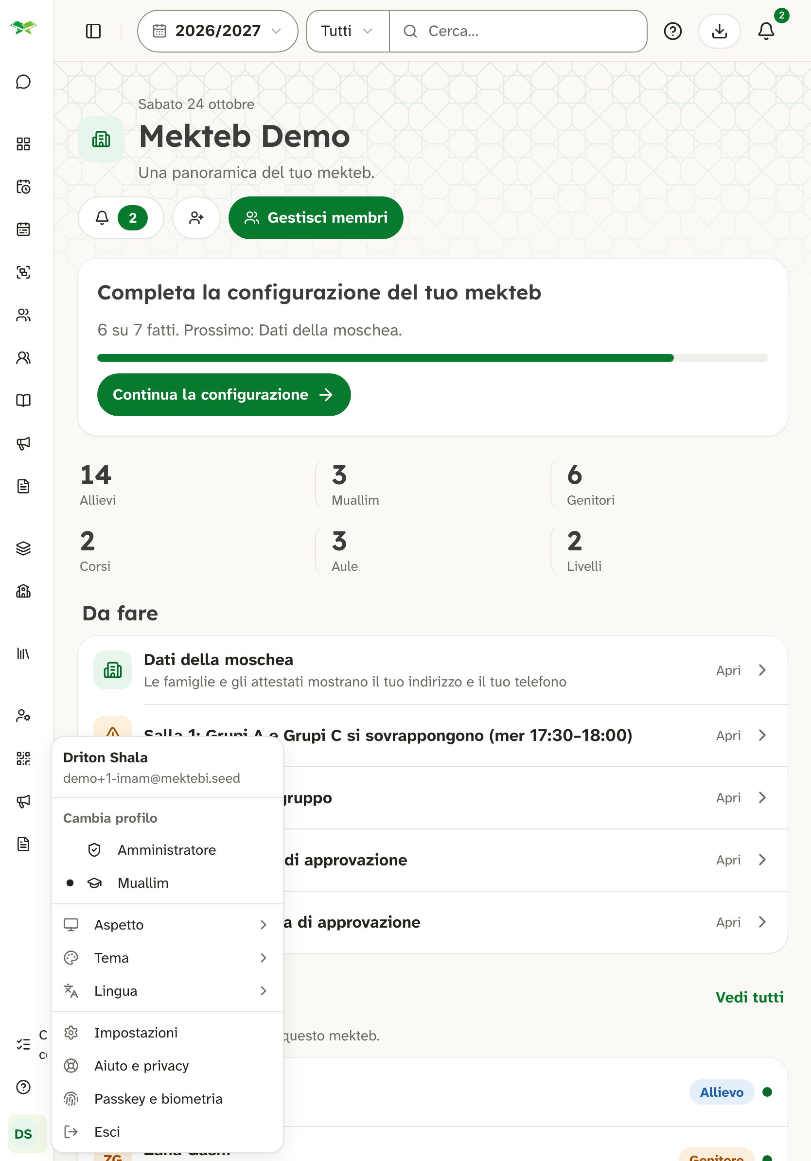 Menu del profilo di Driton Shala; «Cambia profilo» elenca Amministratore e Muallim, attuale Muallim.